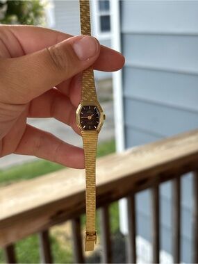 Vintage dainty Gold Tone Women's Dress Watch with Black Dial